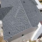 House under construction with roofing in place