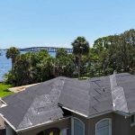 House undergoing roof installation