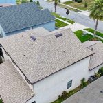 Houses showcasing completed roof installations