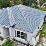 Residence displaying a new roof installation