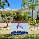 Titan Roofing sign displayed on house