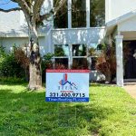 Titan Roofing sign standing in front of the residence