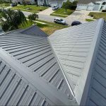 Overhead shot of home featuring metal roofing