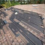 Shingle roof showing signs of damage