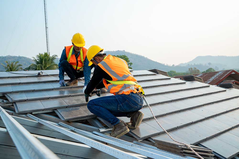 Worker Installing Roof